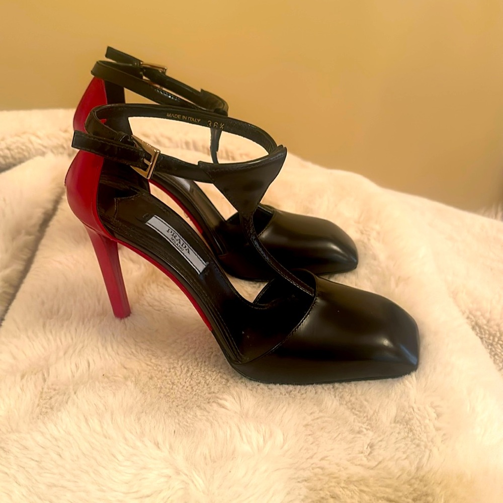 Prada sandals square toe . Black with red heel .